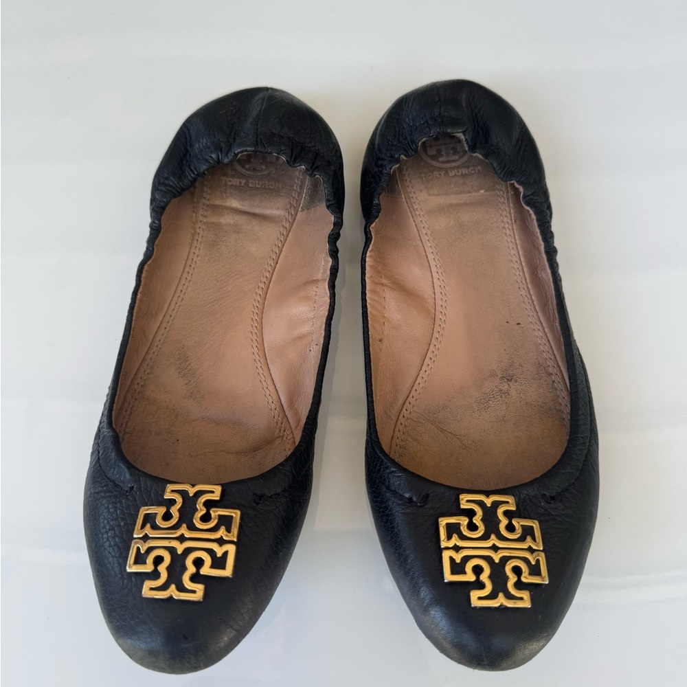 Tory Burch Black and Gold Leather Loafers with Iconic Medallion